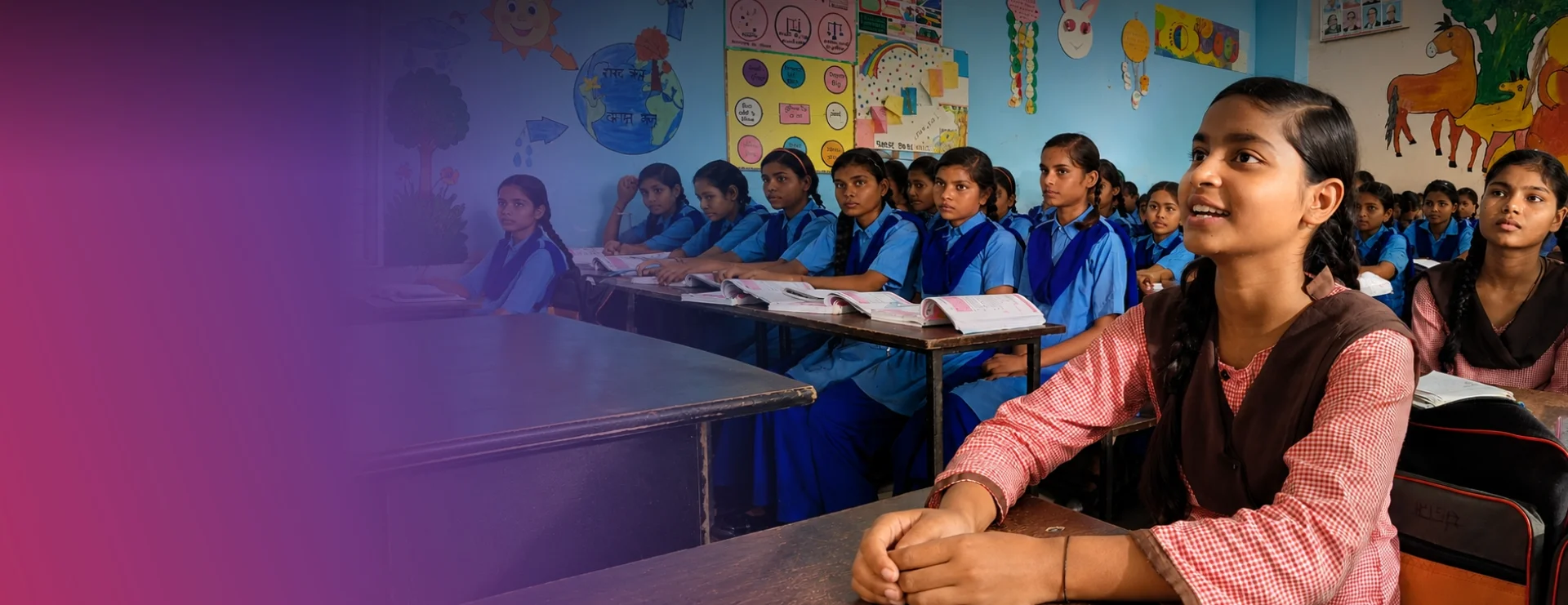 Schoolgirls learning in a classroom supported by Tata Trusts