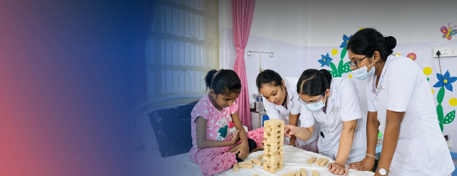 Paediatric care team supporting a child in hospital