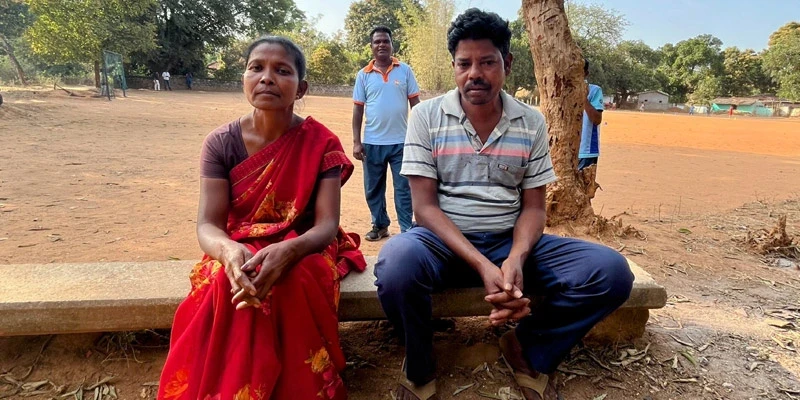 Roshni Bhengra, 33, and Turang Bhengra, 46, with grassroots mentor Hemant Aind (centre), whose early training at the Uyur hockey centre helped shape their daughter Nupur’s journey.